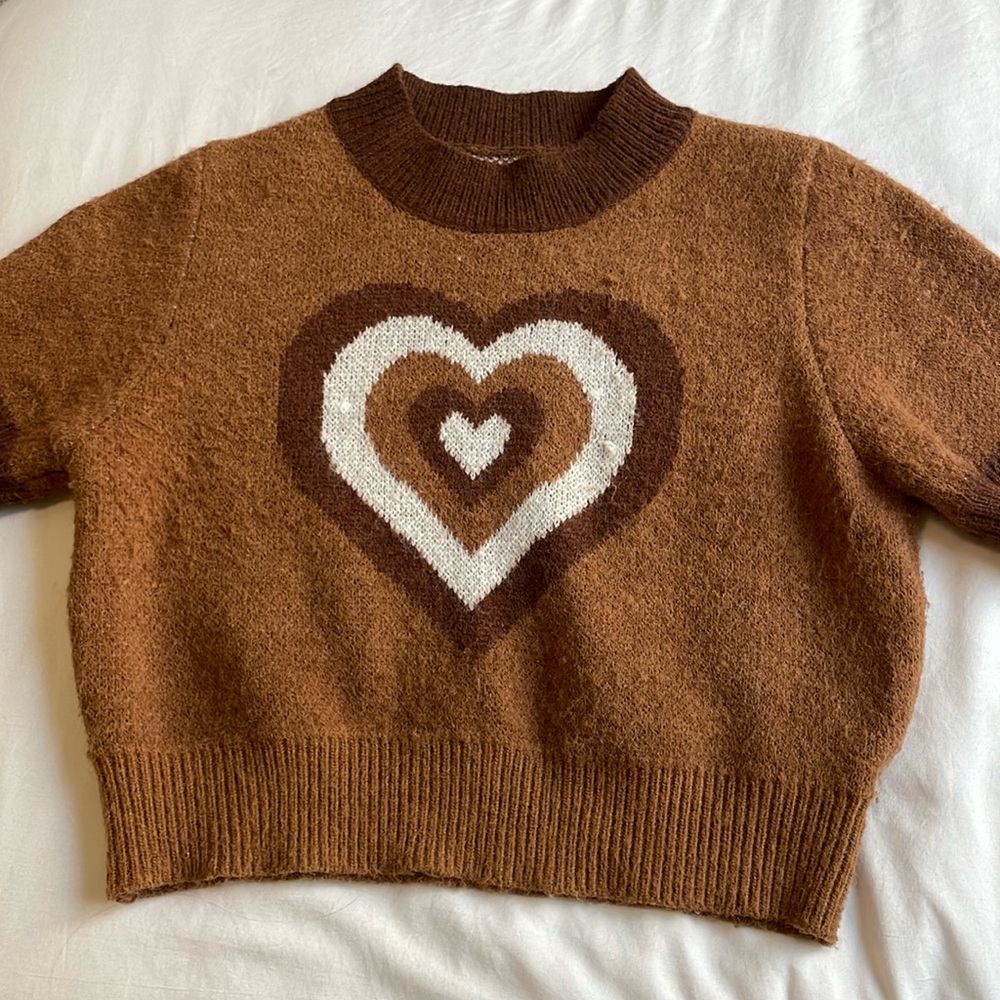 This is a sweater shirt from cider, and in really good condition, hardly worn.